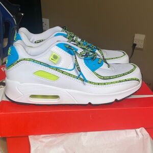 Nike White and Blue Sneakers with Air Max Cushioning